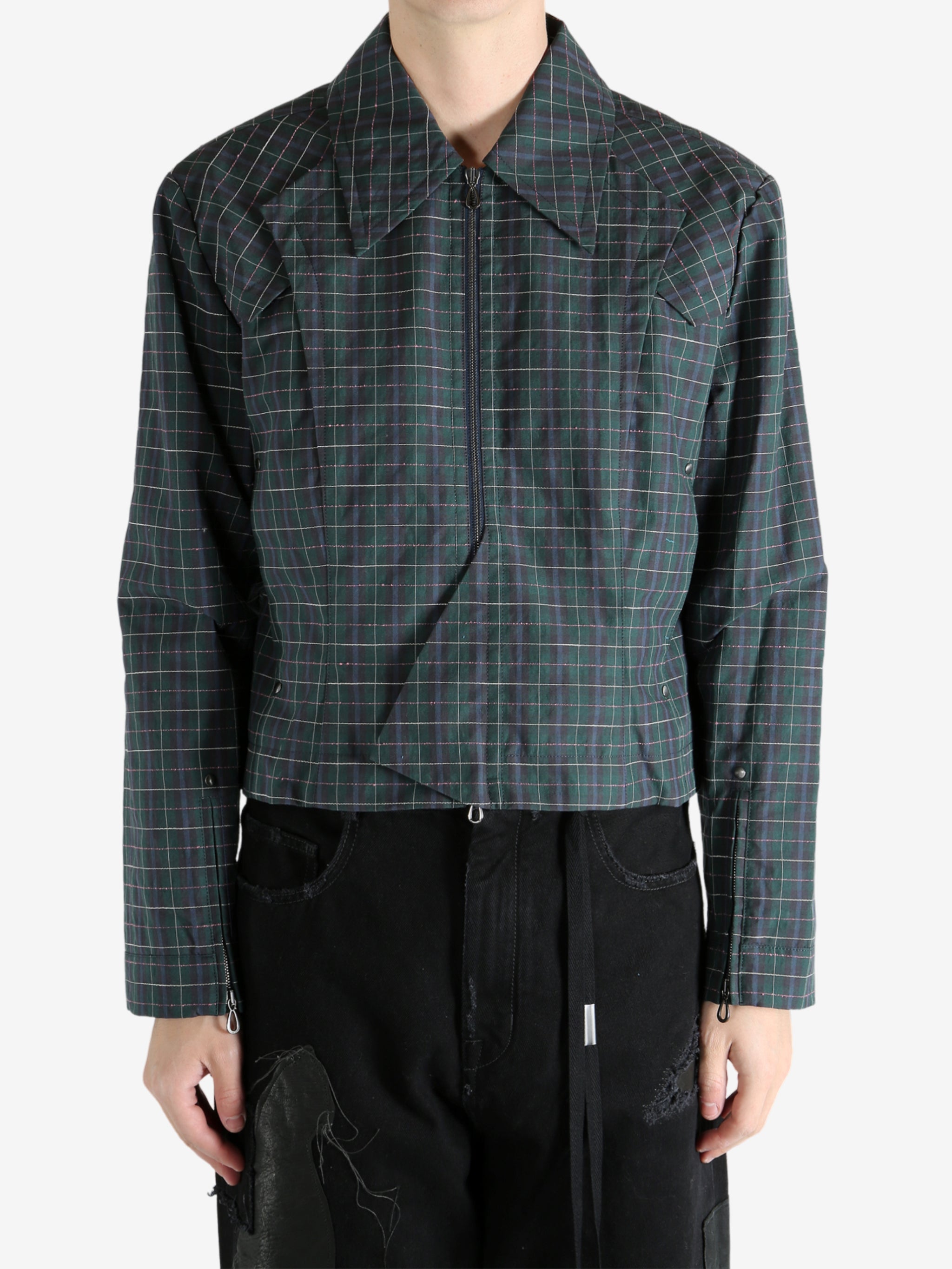 Green blouson worn by a person, showing the blouson's fit