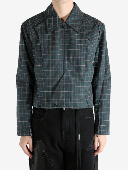 Green blouson worn by a person, showing the blouson's fit