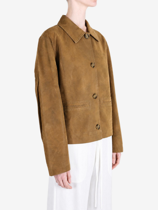 Brown jacket worn by a person, showing the jacket fit
