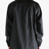 Black jacket worn by a person, showing the jacket's fit