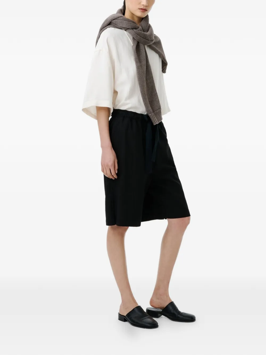 Black shorts, full body view