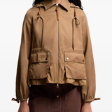 Brown jackets-coats worn by a person, showing the jackets-coats's fit