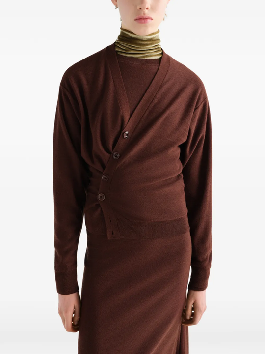 Brown knitwear worn by a person, showing the knitwear fit