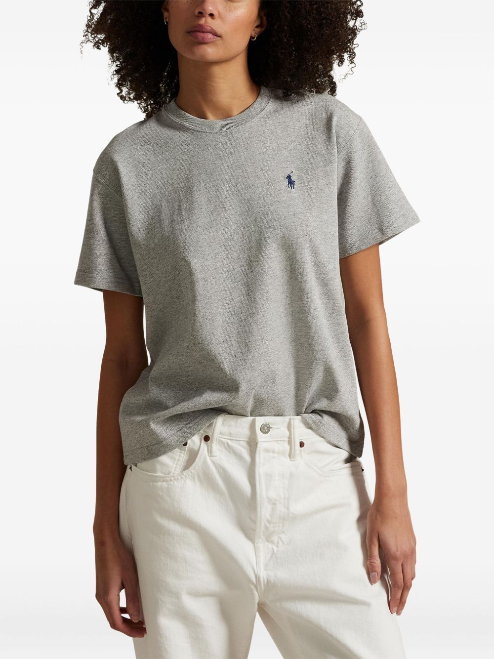 Gray t-shirt worn by a person, showing the t-shirt fit