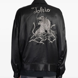 Black jacket worn by a person, showing the jacket's fit