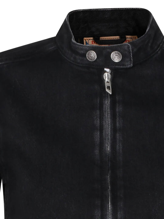 Close up of Black jacket, showing texture of the 82% cotton/ 18% lyocell fabric