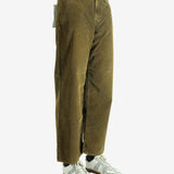 Green pant worn by a person, showing the pant's fit