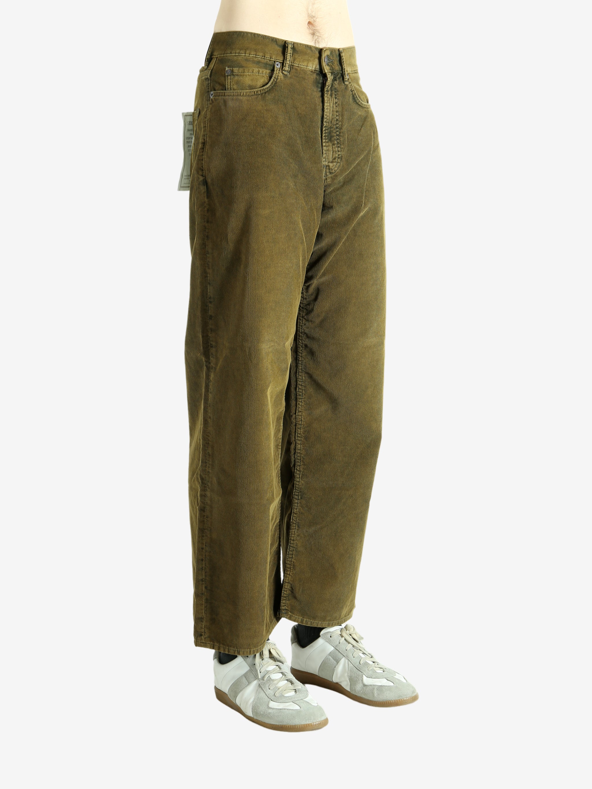 Green pant worn by a person, showing the pant's fit