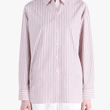 Pink shirt worn by a person, showing the shirt fit