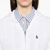 close up of white shirt, showing texture of the cotton fabric
