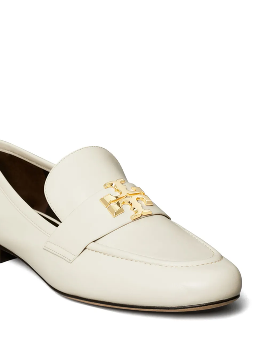 white loafers-mules,showing texture of the leather fabric