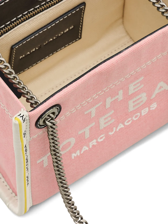 Close up of pink bags, showing texture of the cotton fabric