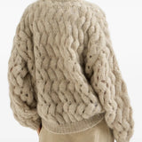 Tan knitwear, full body view