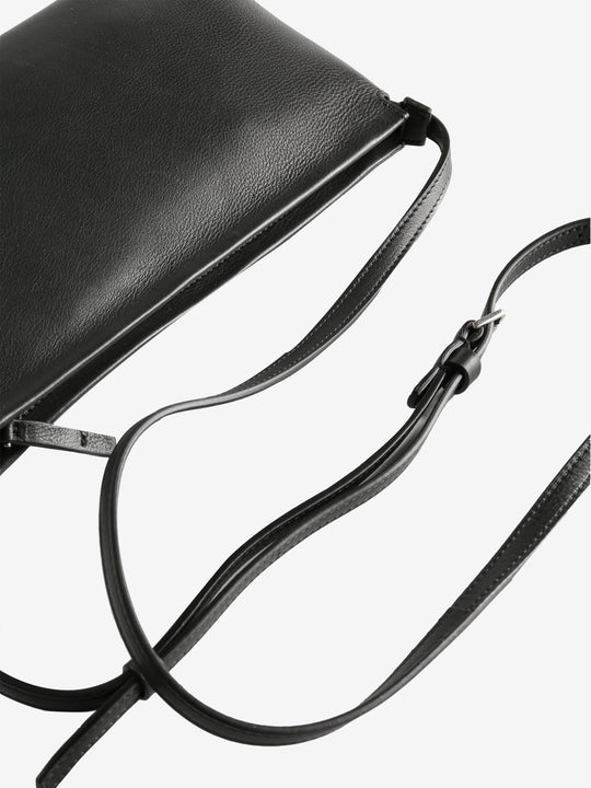 Close-up of black bag showing texture of the leather fabric