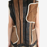 Black vest worn by a person, showing the vest fit