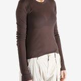 Brown t-shirt worn by a person, showing the t-shirt's fit