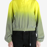 yellow jacket worn by a person, showing the jacket fit