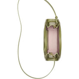 Close up of the green bag, showing texture of the leather fabric