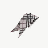 Close up of pink scarve, showing texture of the fabric