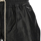 Close up of Black shorts, showing texture of the 48% alpaca/ 30% nylon/ 20% wool/ 2% spandex fabric