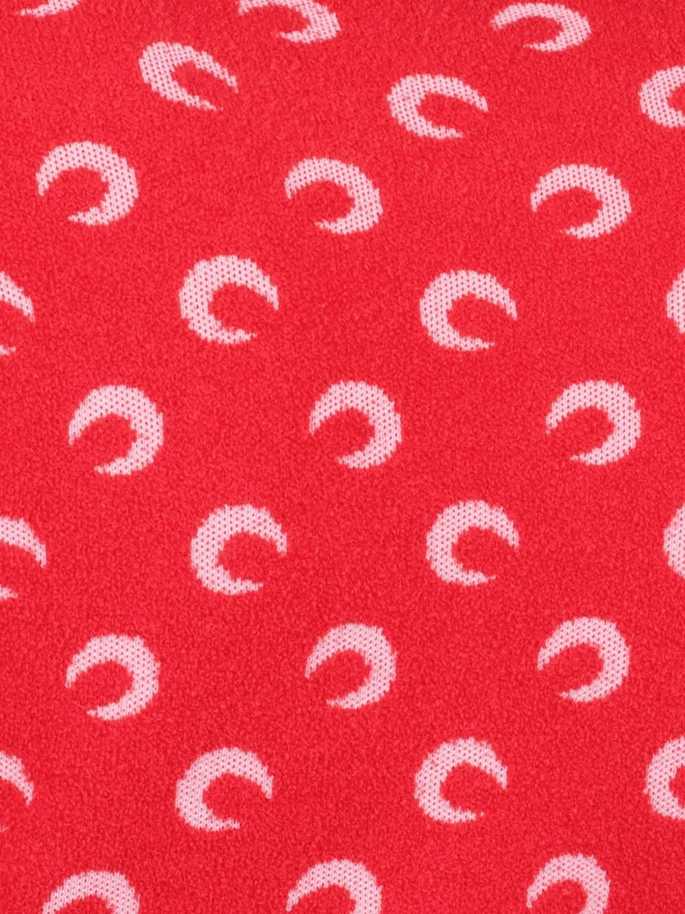 Close up of Red top, showing texture of the 53% cotton/ 30% polyamide/ 17% viscose fabric