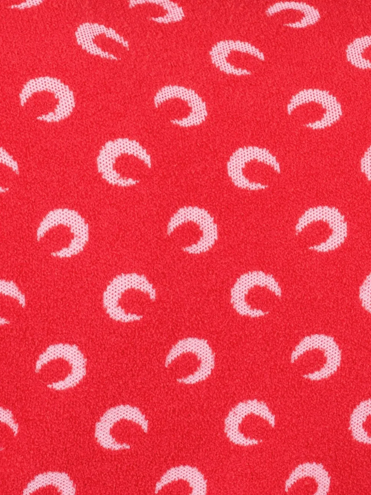 Close up of Red top, showing texture of the 53% cotton/ 30% polyamide/ 17% viscose fabric