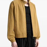 Brown jacket worn by a person, showing the jacket fit