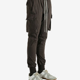 Brown pants worn by a person, showing the pants' fit