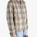 Yellow  jacket worn by a person, showing the  jacket's fit
