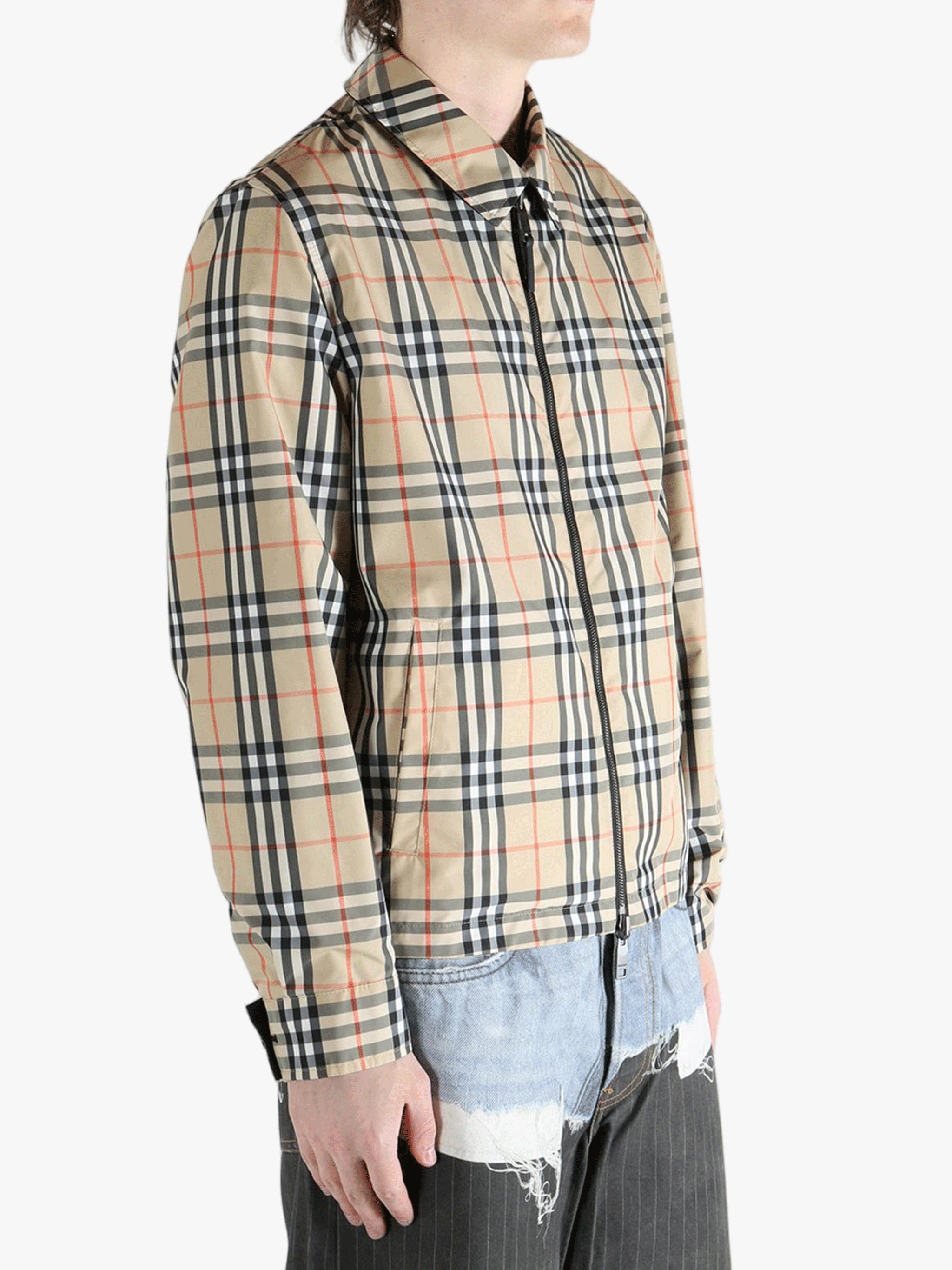 Yellow  jacket worn by a person, showing the  jacket's fit