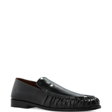 Black loafer, side view