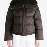 Brown jacket worn by a person, showing the jacket fit