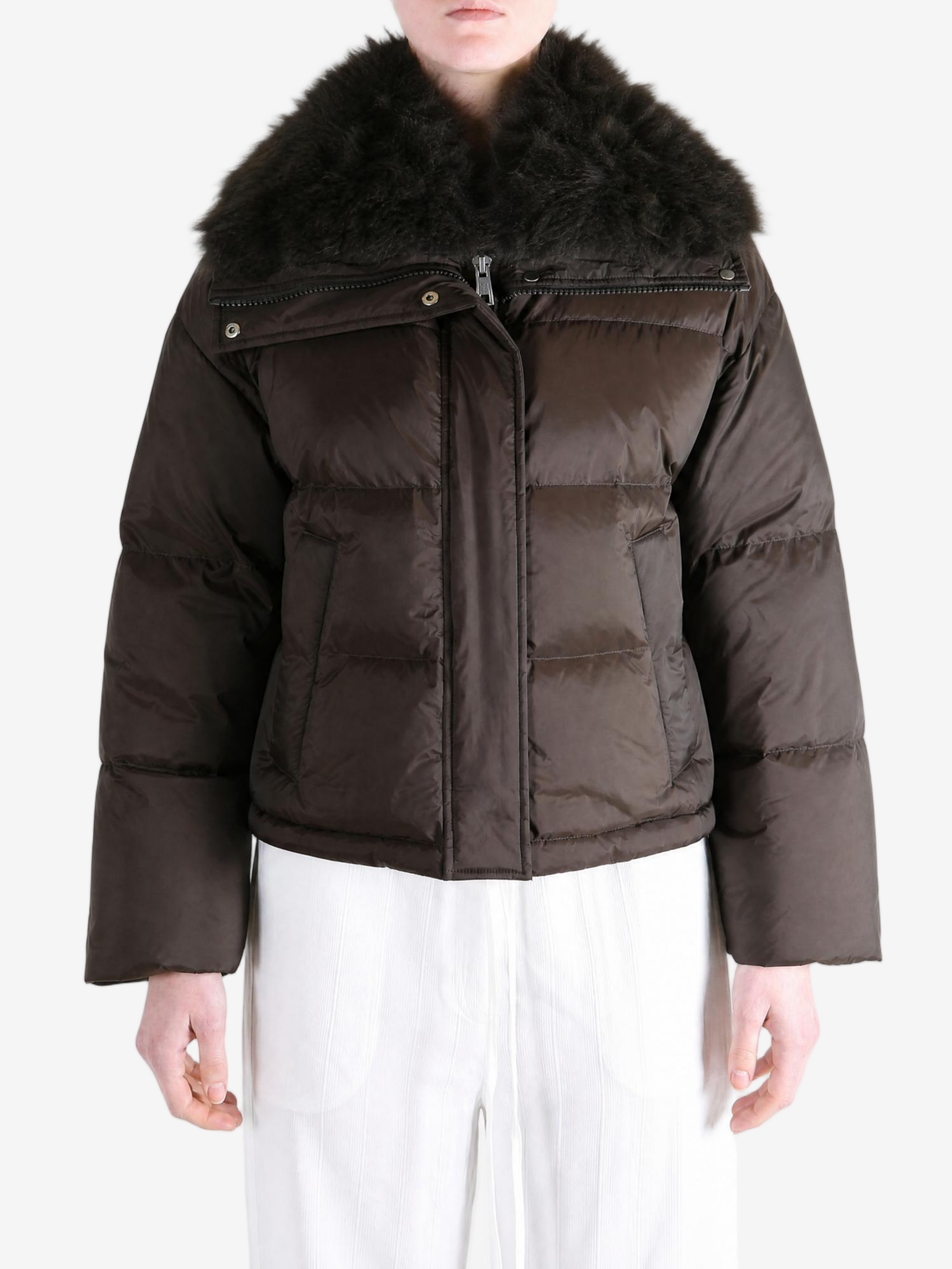 Brown jacket worn by a person, showing the jacket fit