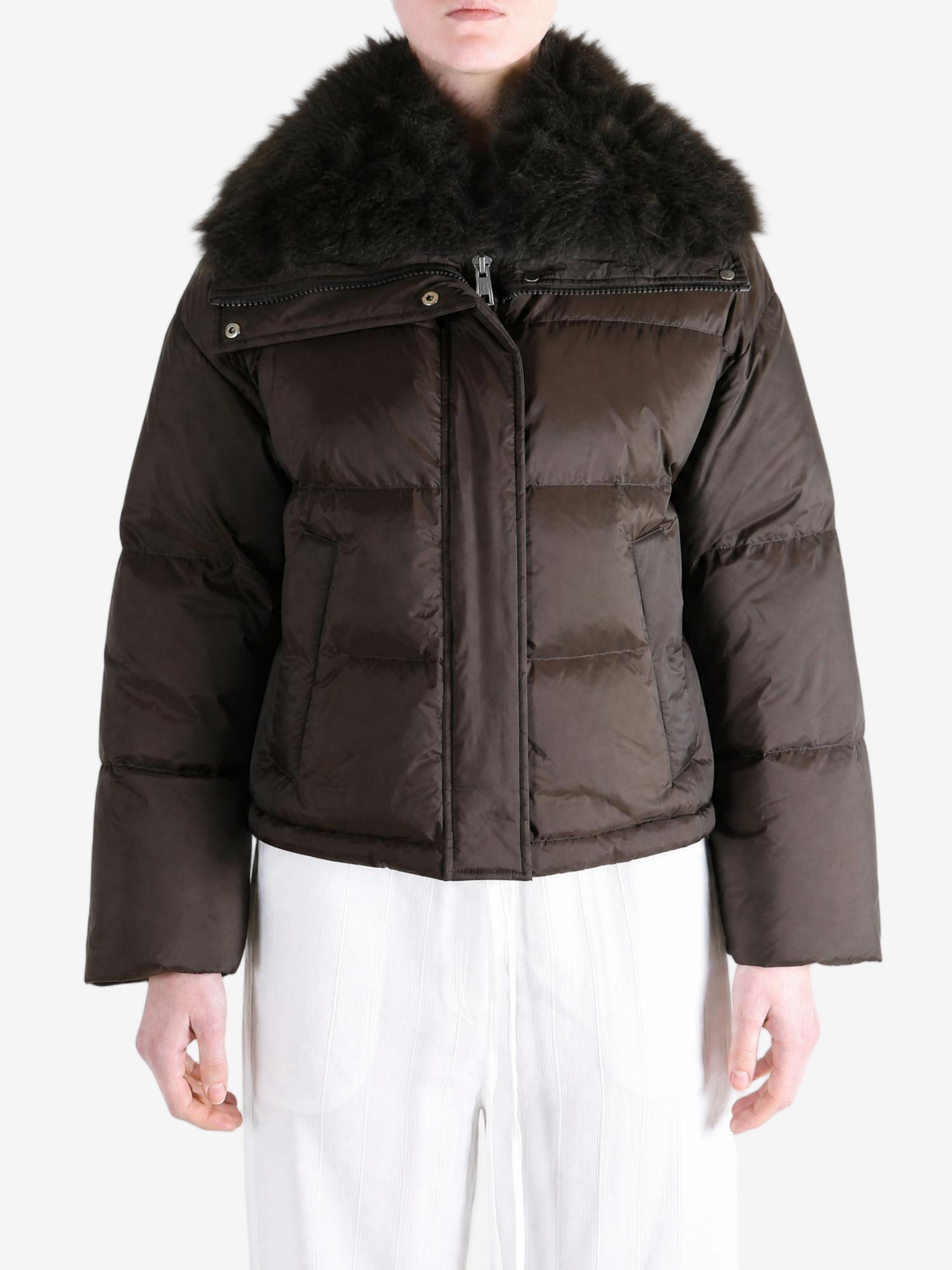 Brown jacket worn by a person, showing the jacket fit