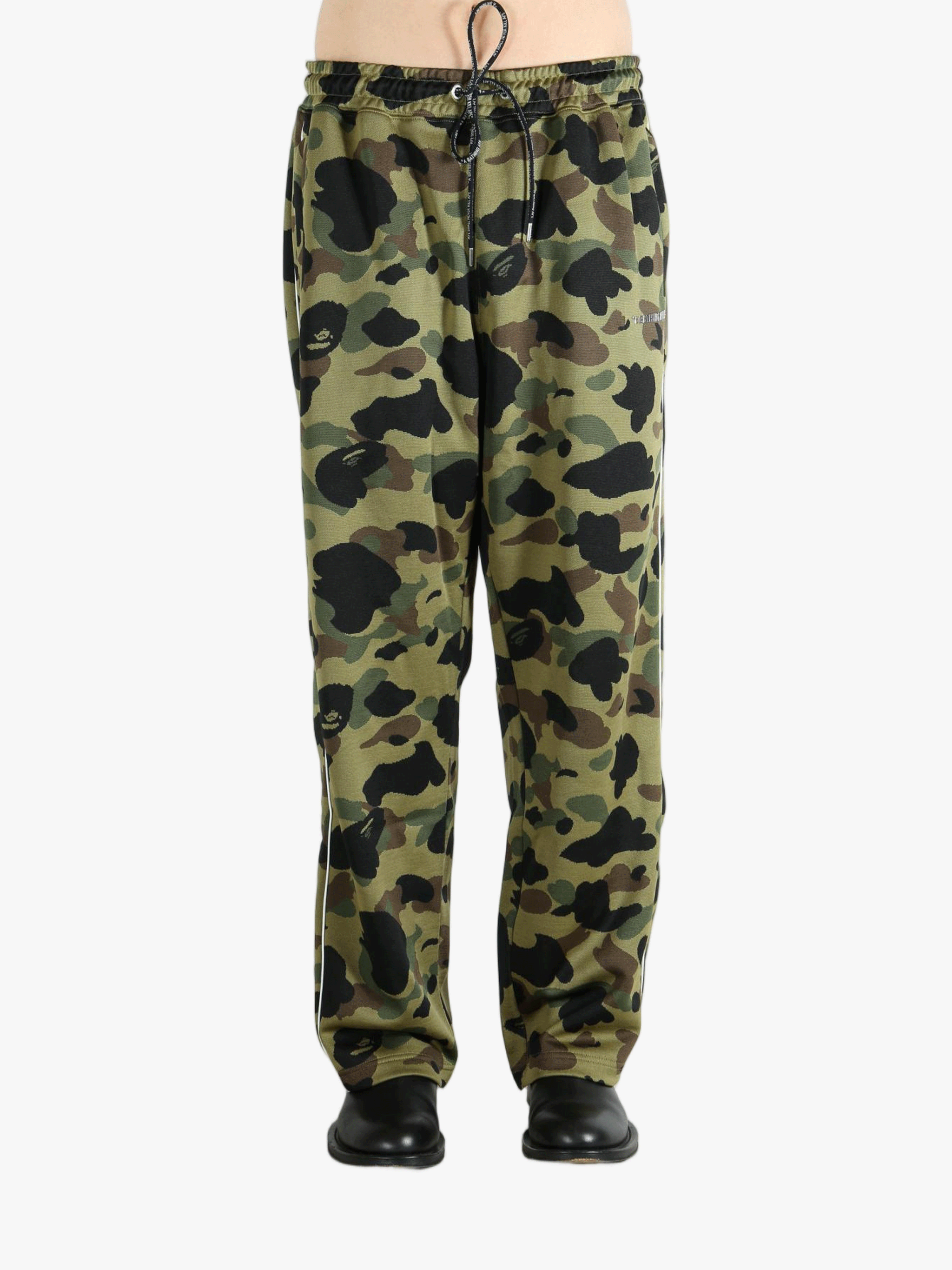 Camouflage pants worn by a person,showing the pants's fit