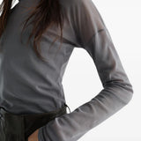 Grey top worn by a person, showing the top fit