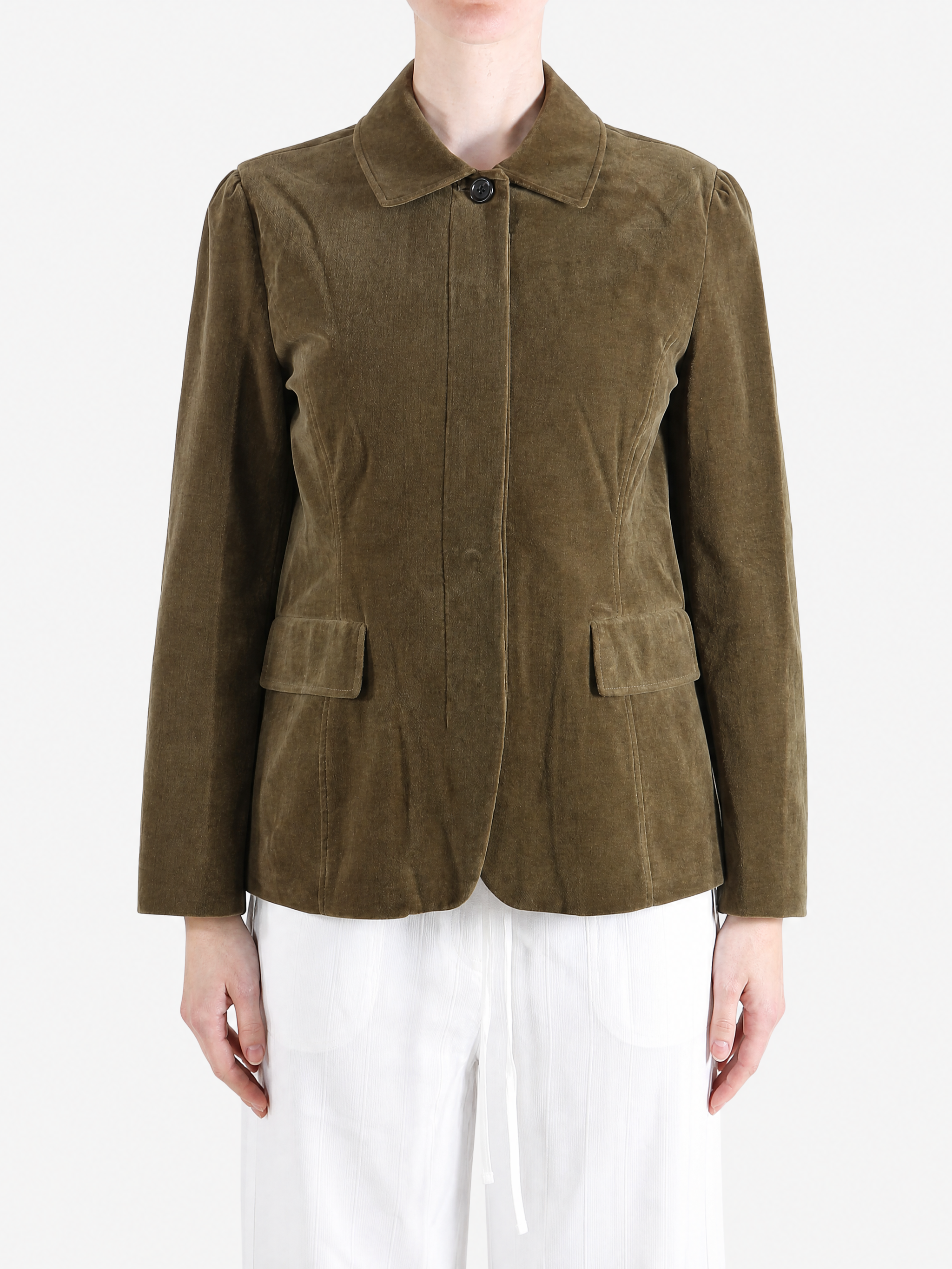 Brown jacket worn by a person, showing the jacket fit