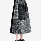 Black skirt worn by a person, showing the skirt fit