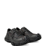 black sneakers,side view