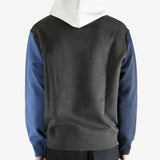 Color-blocked hoodie worn by a person, showing the hoodie fit