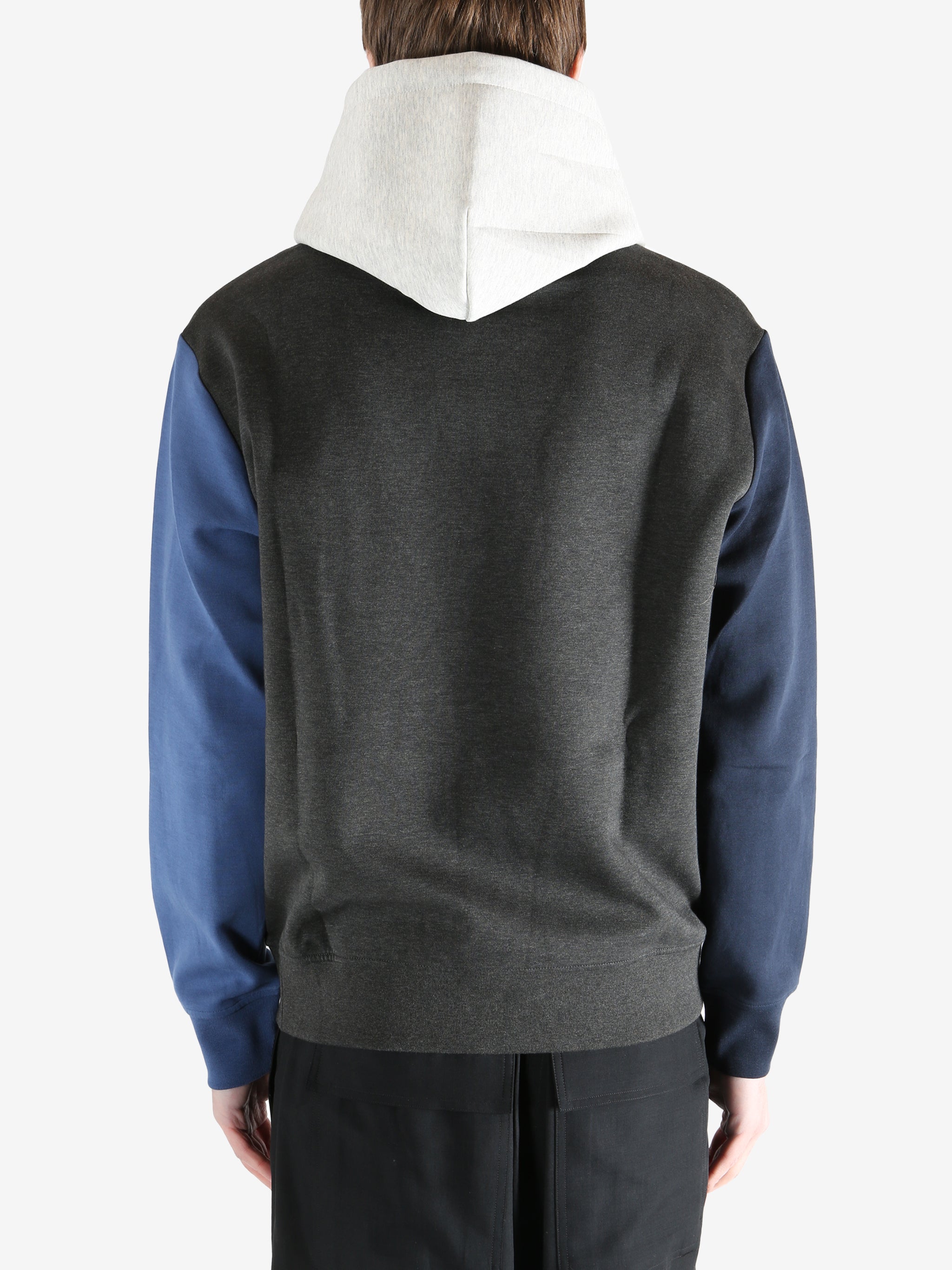 Color-blocked hoodie worn by a person, showing the hoodie fit