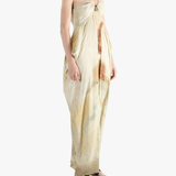 White dress worn by a person, showing the loose fit.