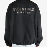  Black tops worn by a person, showing the tops fit