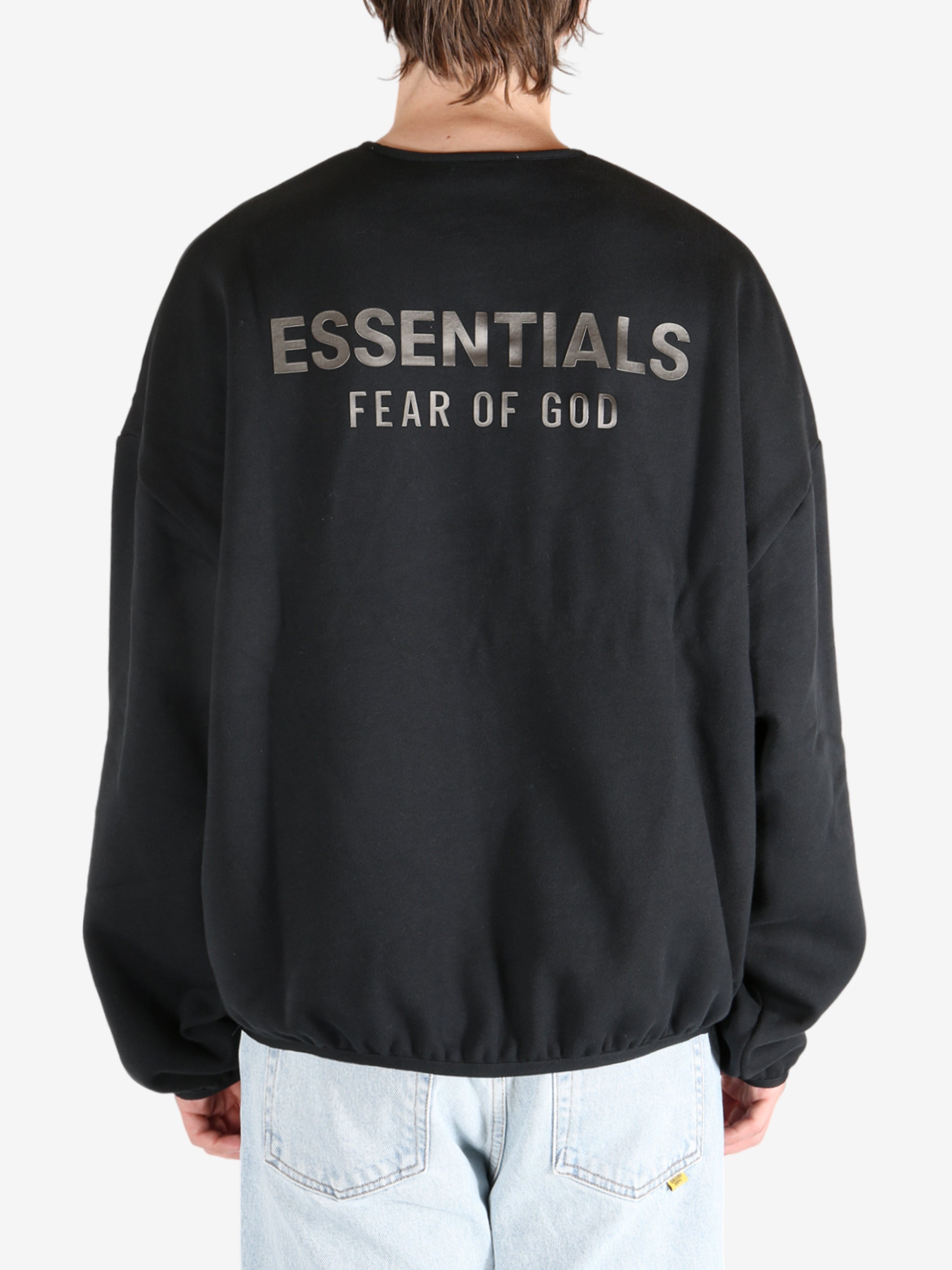  Black tops worn by a person, showing the tops fit