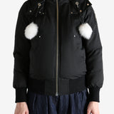 Black jacket worn by a person, showing the jacket's fit