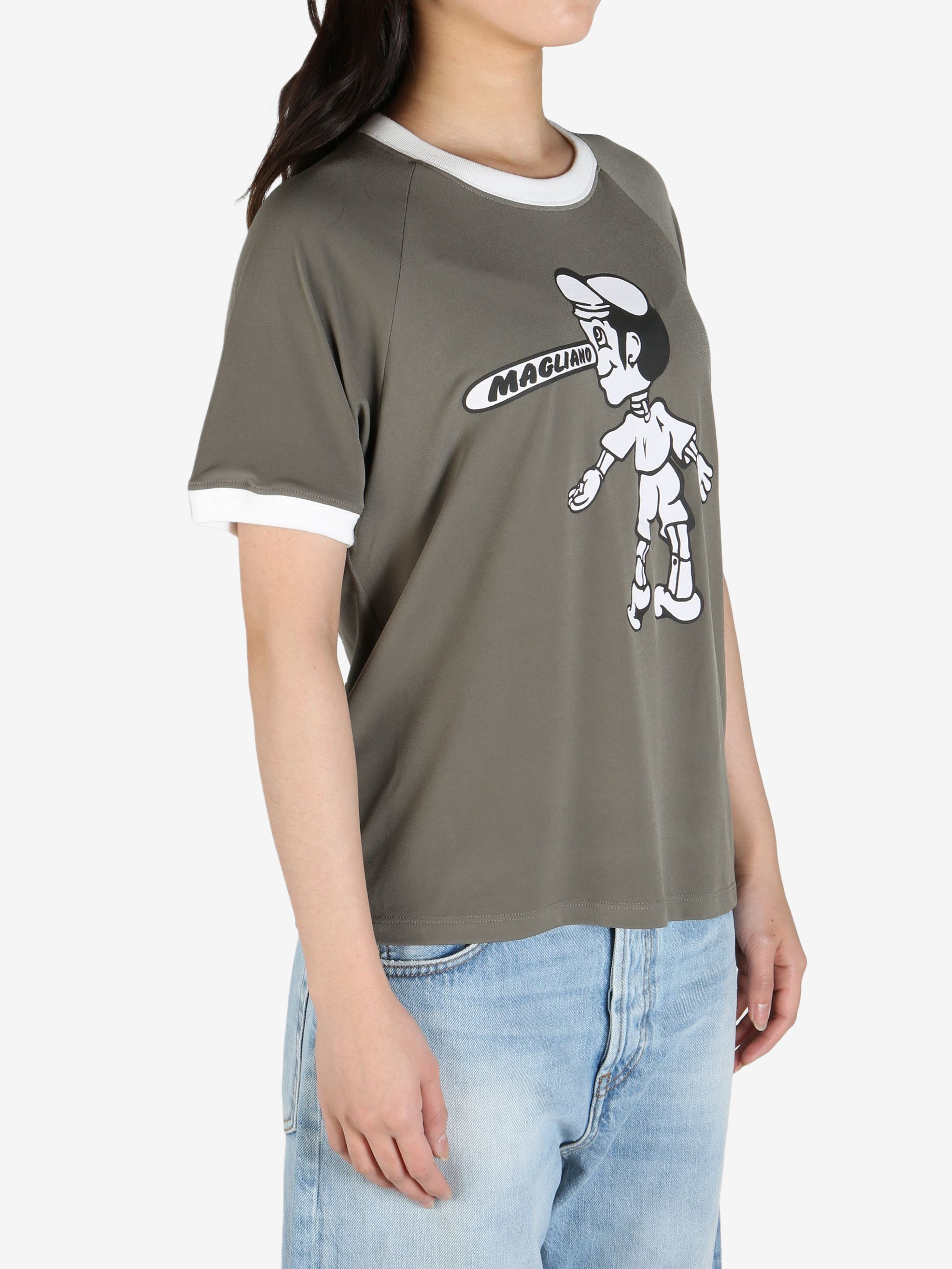 Grey tee worn by a person, showing the 
 tee's fit