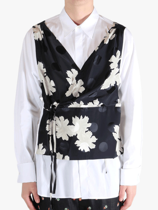 White shirt worn by a person, showing the shirt's fit