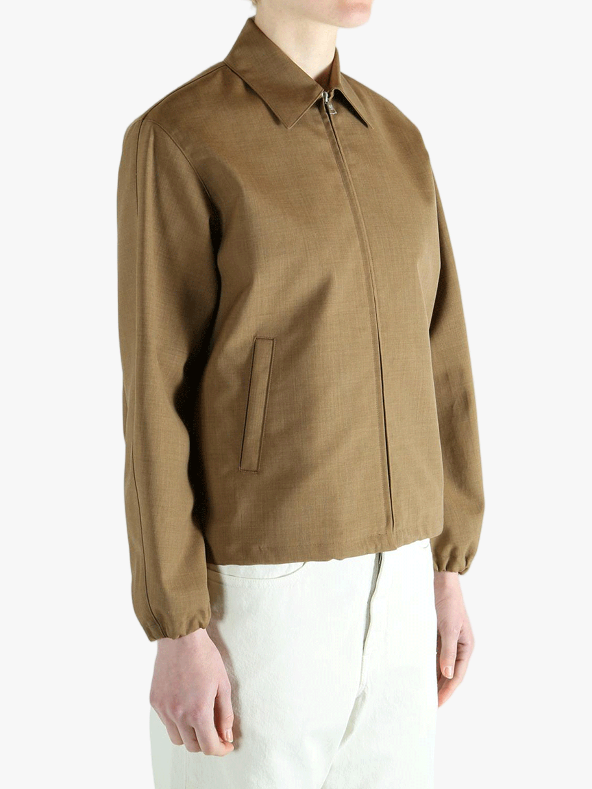 Brown jacket worn by a person, showing the jacket fit