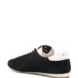 Black flat, back view