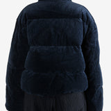 Navy coats worn by a person, showing the coats fit